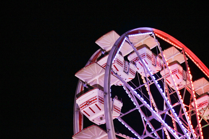 fair, amusement park ride, red, illuminated, black background, low angle view, ferris wheel, blue, studio shot, 5K, carnival, lights, united states, spinning