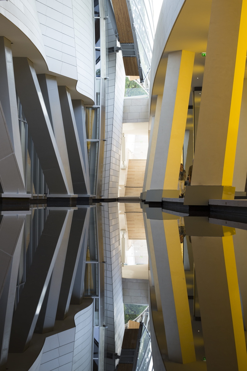 industry, reflection, structure, outdoors, day, yellow, directly below, built structure, in a row, building, building exterior, sky, pattern, no people