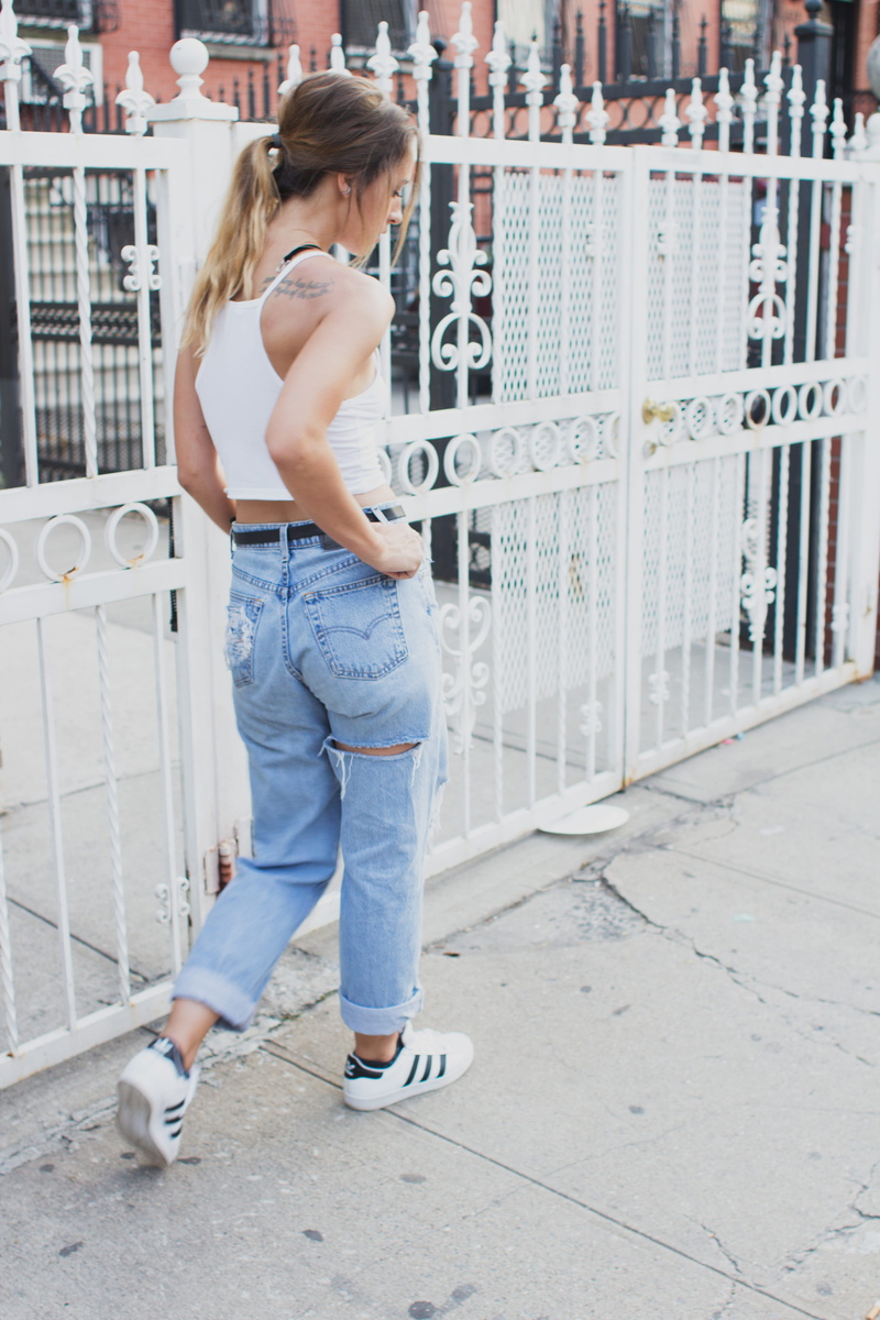 built structure, 90s fashion, leisure activity, urban, tiled floor, girl, females, lifestyles, hair, shorts, rear view, jeans, edgy, childhood, casual clothing