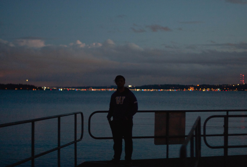 standing, rear view, kirkland, real people, 2K, sea, one person, united states, portrait, cloud - sky, beauty in nature, underexposed, city, outdoors