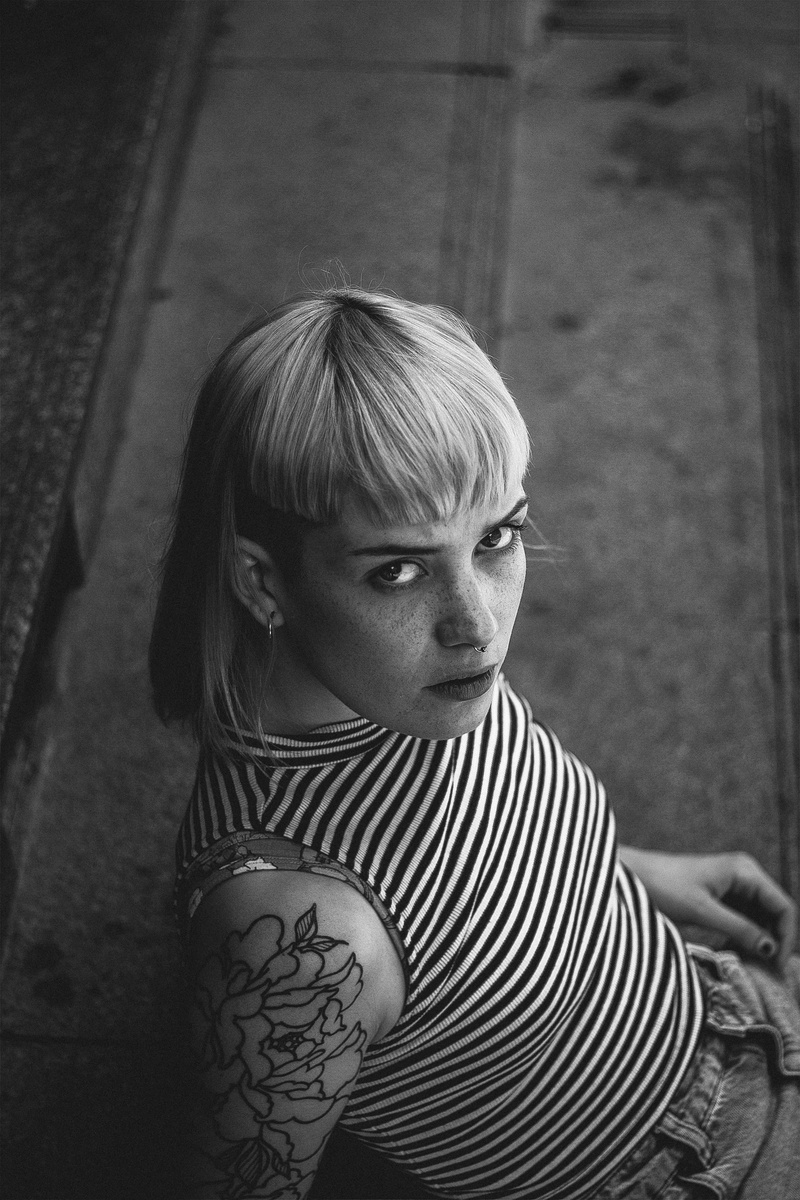 serious, short hair, one person, woman, casual clothing, real people, female, adult, bench, lifestyles, person, girl, leisure activity, vintage, females