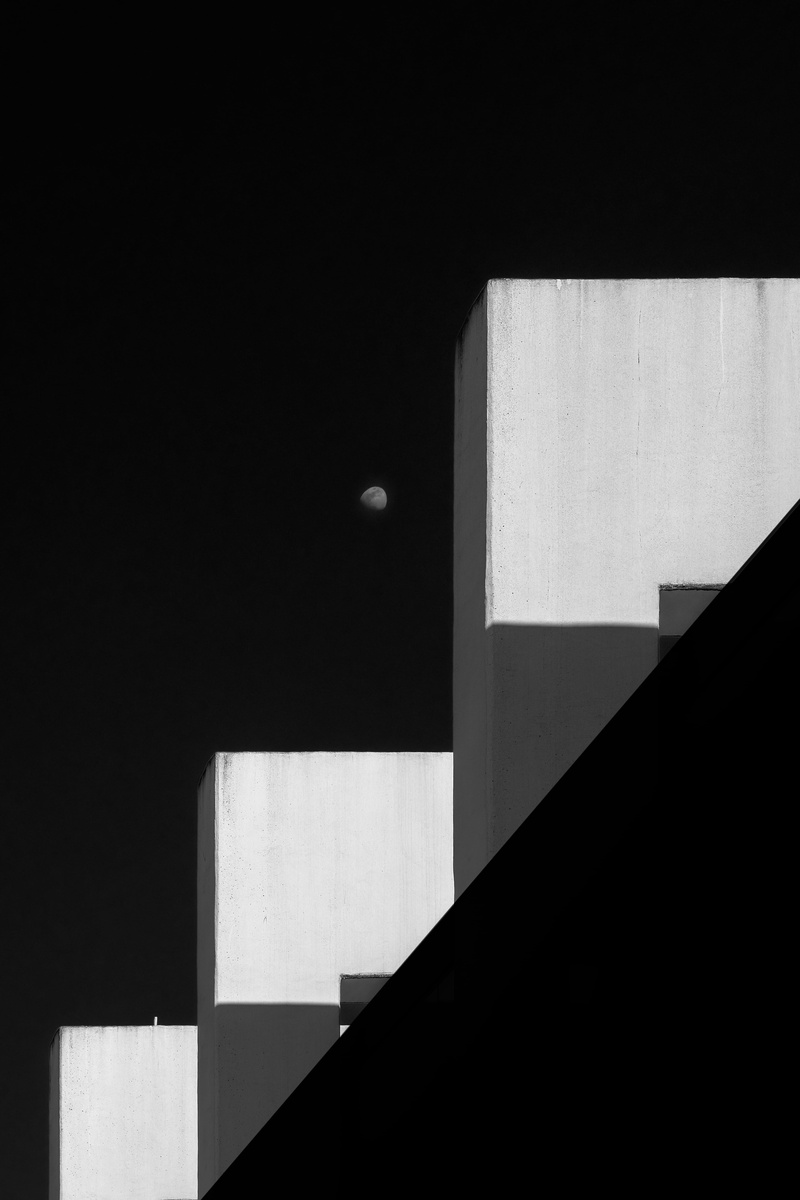 building, wall - building feature, geometric shape, low angle view, universe, shadow, copy space, banister, astronomy, built structure, handrail, concrete
