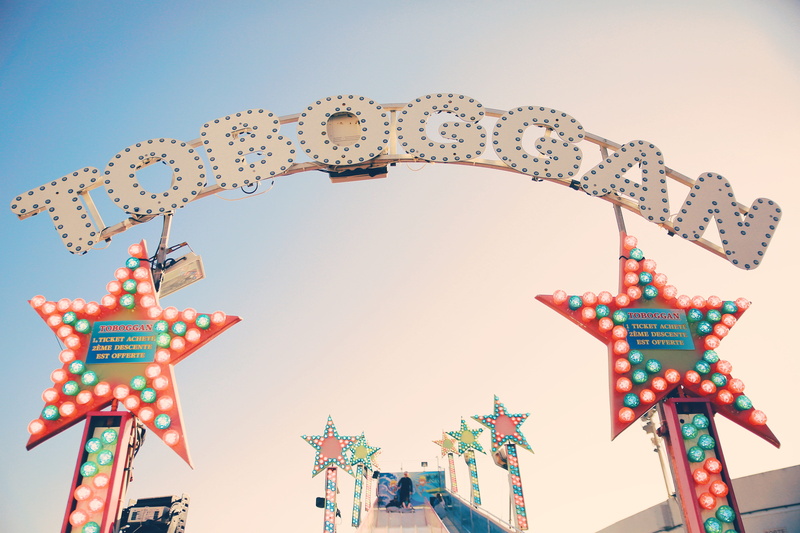 amusement park ride, art and craft, fun, color, holiday, low angle view, blue sky, retro, nature, game, animal representation, amusement park, person, sky