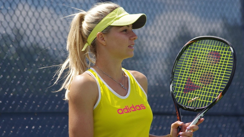 outdoors, day, sports clothing, racket, tennis, exercising, adult, 1080P, one person, blond hair, hairstyle, court, hair, lifestyles, blonde, sport, looking away