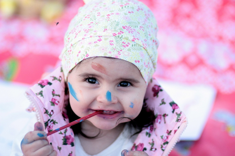innocence, offspring, close-up, happiness, childhood, child, pink color, headshot, body part, one person, human face, looking at camera, front view, little