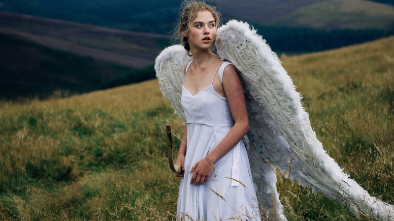 face, outdoors, fashion, adult, hills, plant, bow, field, young adult, wings, contemplation, animal wing, landscape, women, white dress, angel, model, long hair