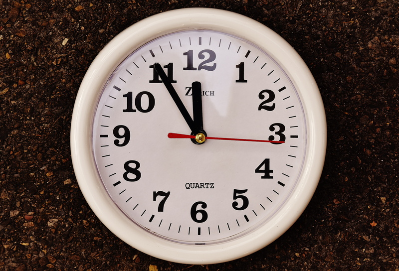 white color, wall - building feature, indoors, single object, timepiece, circle, minute hand, disaster, clock, shape, number, geometric shape, pointer
