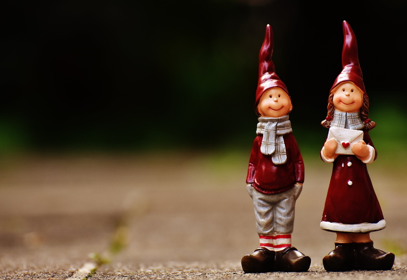 toy, figurines, human representation, celebration, childhood, heart, deco, red, two objects, creativity, holiday, contemplative, black background, representation