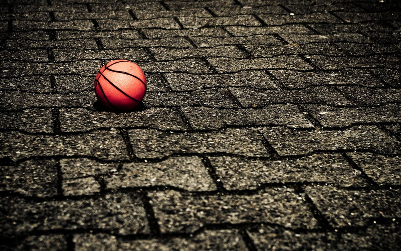 street, sunlight, competition, outdoors, high angle view, single object, day, paving stone, black Color, basketball - Sport, stone, shadow, playing, basketball - Ball