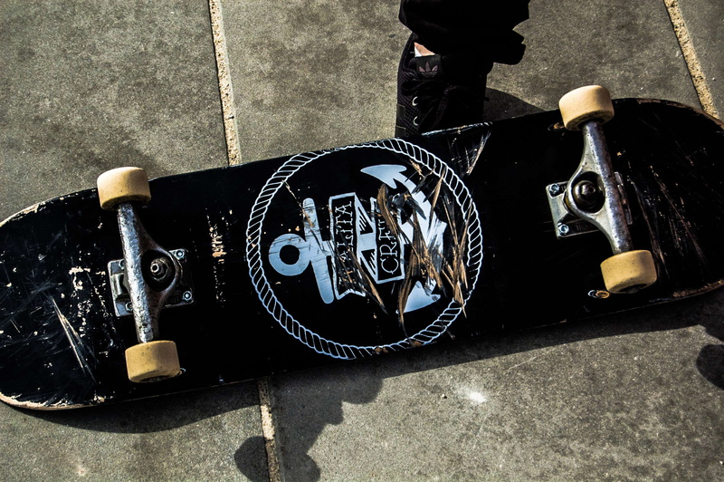 wheel, skateboards, skate, floor, extreme, man, light, skateboard, black sneakers, skateboarder, city, mode of transportation, board, sunlight, shadow