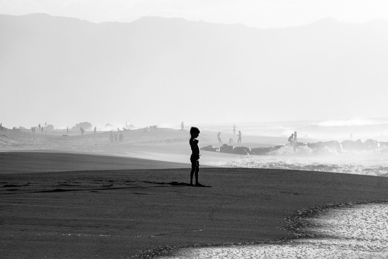 guy, alone, real people, contrast, beach, coastline, human arm, day, sky, leisure activity, outdoors, land, coast, non-urban scene, shoreline, lifestyles