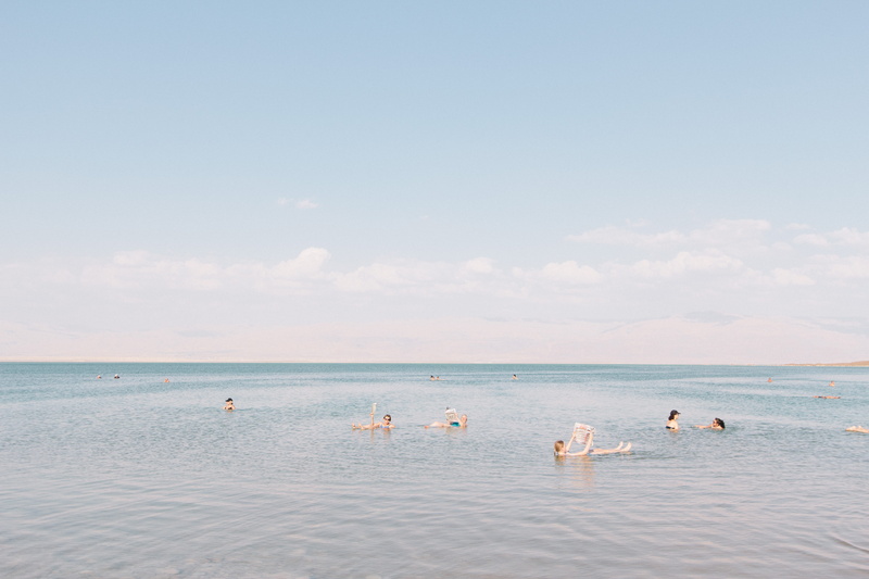 horizon, sky, tourism, group of animals, cloud, ponytail, dead sea, water, daytime, 5K, israel, swimming, ocean, swim, animal, woman, non-urban scene