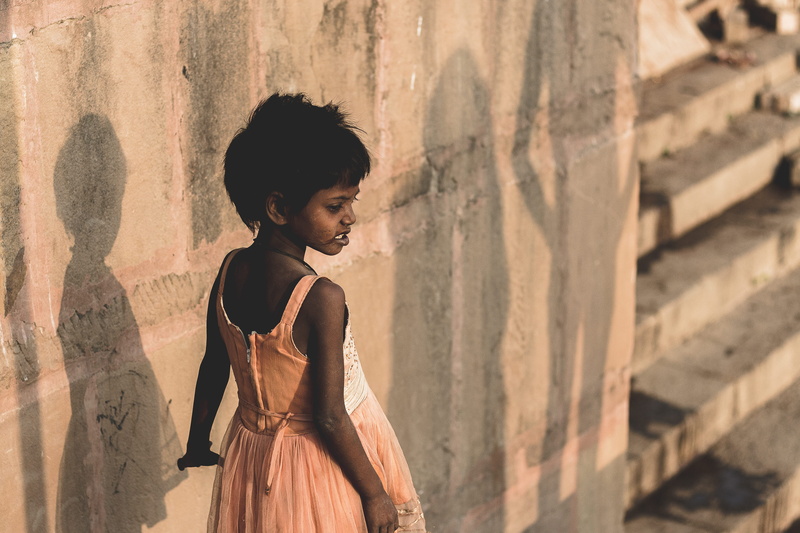 day, childhood, standing, the past, built structure, wearing, hairstyle, child, pink, beige, women, wall - building feature, architecture, lifestyles, leisure activity