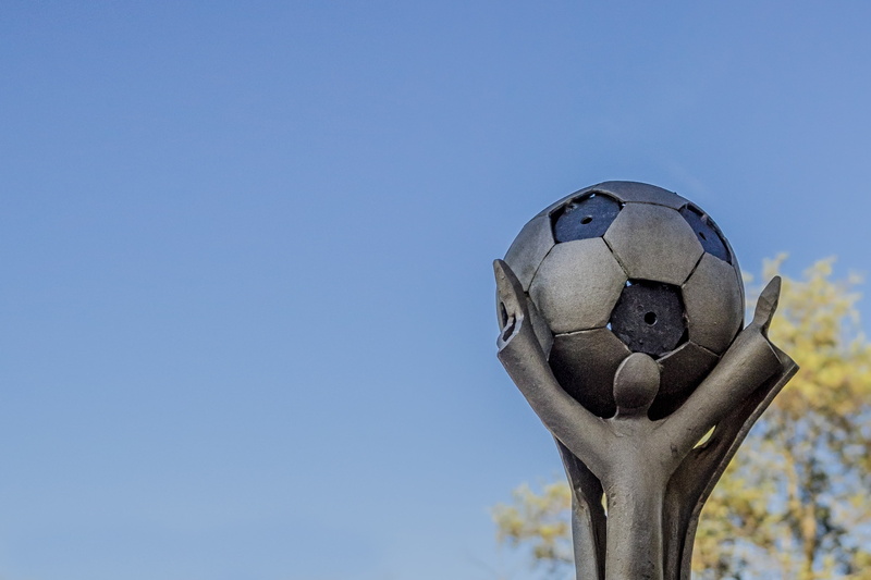 fun, cohesion, award, art and craft, soccer, sky, artwork, art, blue, 2K, play, representation, day, community, trophy, outdoors, sports equipment, plant
