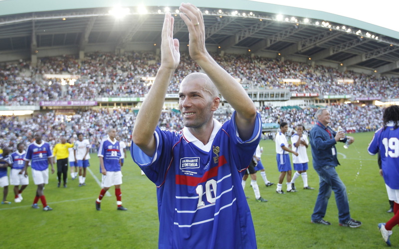 focus on foreground, white, group of people, human limb, red, people, human arm, jersey, grass, young adult, stadium, shirt, players, team sport, blue