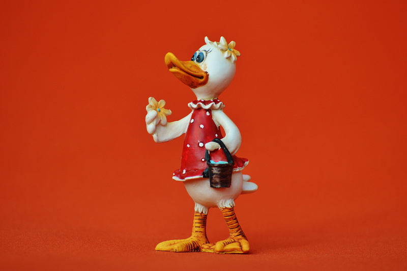 studio shot, colored background, human body part, representation, sweet, figurine, copy space, creativity, craft, Bucket, Duck, deco, standing, 5K, full length