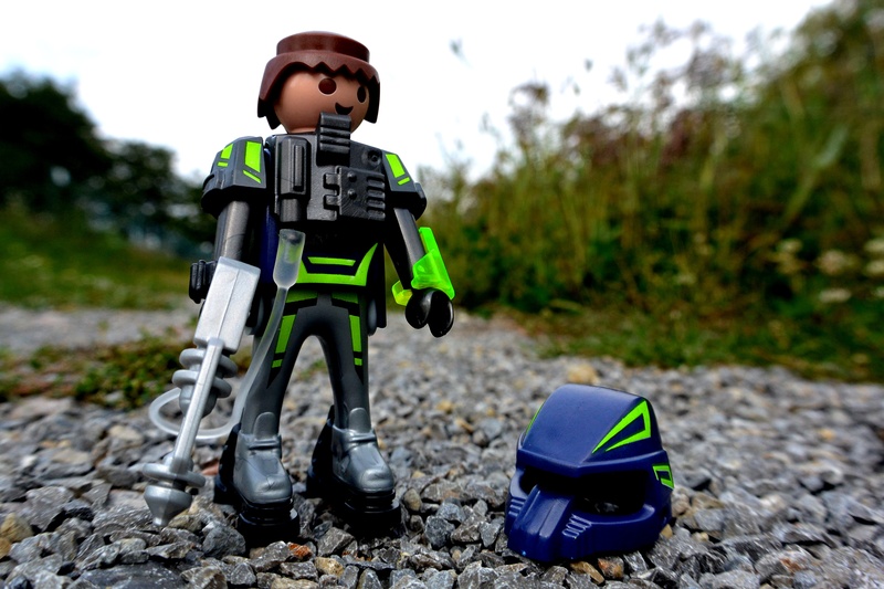 headwear, males, real people, armed, one person, day, lifestyles, sport, crash helmet, space, figure, close, outdoors, childhood, helmet, weapon, child