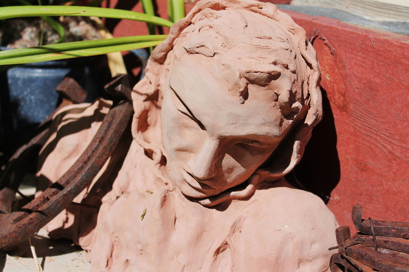 head, handiwork, craft, new mexico, day, male likeness, art, carvings, female likeness, form, expression, sculpture, santa fe, nature, studio, xeriscape