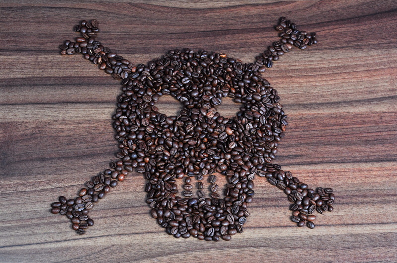 pattern, indoors, animal themes, high angle view, table, coffee pictures, creativity, coffee, ornate, skull, 2K, freshness, skull and crossbones, roasted coffee bean
