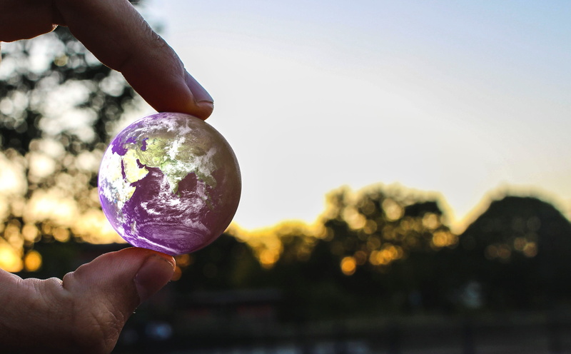 close-up, personal perspective, sphere, holding, lifestyles, nature, human hand, hands, summer, globe, leisure activity, out, finger, warm, sunset, real people