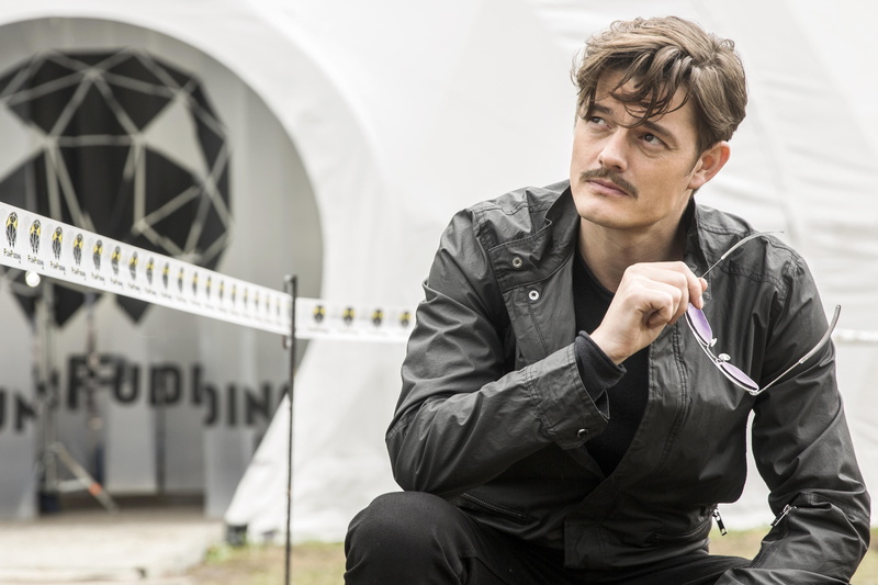 people, focus on foreground, jacket, front view, clothing, one Person, day, serious, sitting, actor, sam riley, technology, males, architecture, black