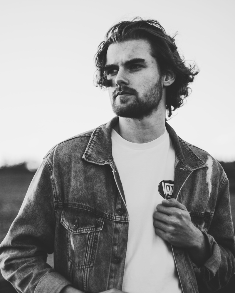 beard, actor, wear, one person, young adult, mustache, music, denim jacket, real people, pose, young men, musician, men, denim, standing, man, facial expression
