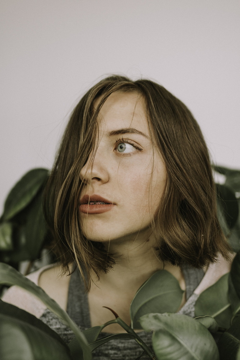 young adult, close-up, beauty, front view, beautiful woman, one person, portrait, clothing, brown hair, contemplation, looking, headshot, hood - clothing