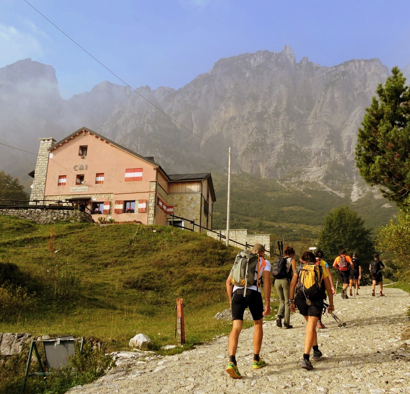 excursion, backpack, people, scenics - nature, leisure activity, men, mountain, real people, building exterior, women, lifestyles, outdoors, trail, mountain range
