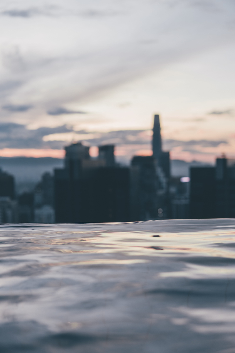 outdoors, sunset, cityscape, dusk, 5K, high rise, fitness, architecture, building exterior, working out, ice, cloud, landscape, sky, sports, selective focus