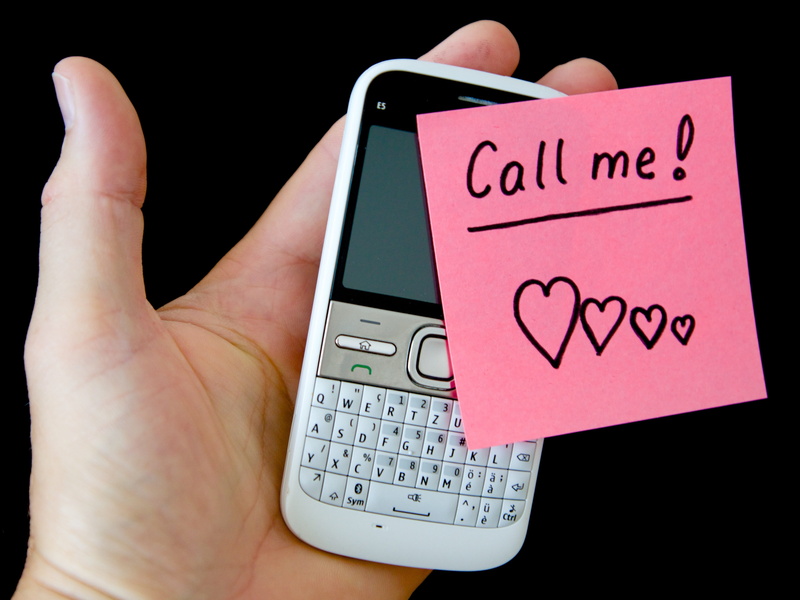 text, message, wireless technology, human body part, embassy, black background, studio shot, mobile phone, 4K, human hand, list, finger, note, indoors