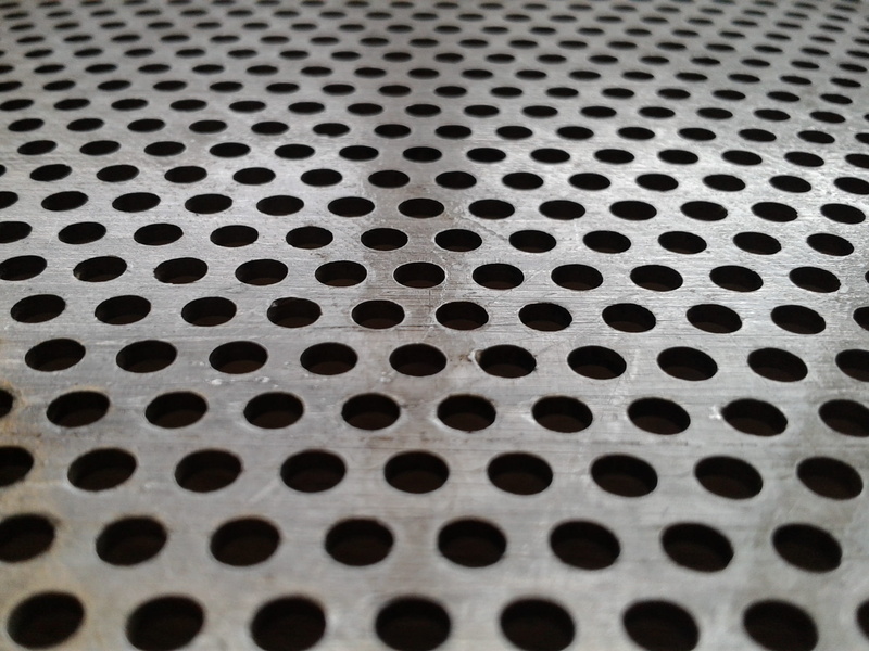 selective focus, abstract, textured, plate, indoors, holes, in a row, metallic, alloy, full frame, backgrounds, grid, stainless, circle, spotted, geometric shape