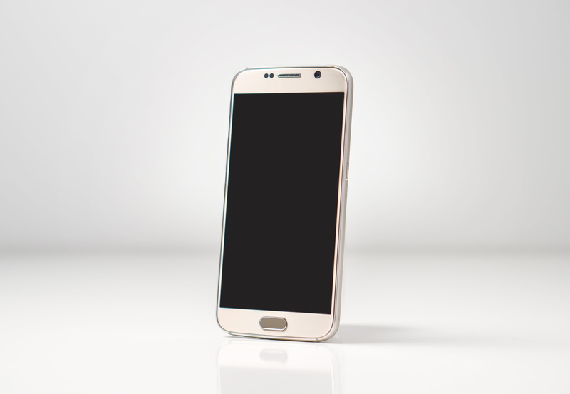 close-up, telephone, no people, global communications, android, using phone, personal accessory, copy space, electronics, photo messaging, indoors, touch screen