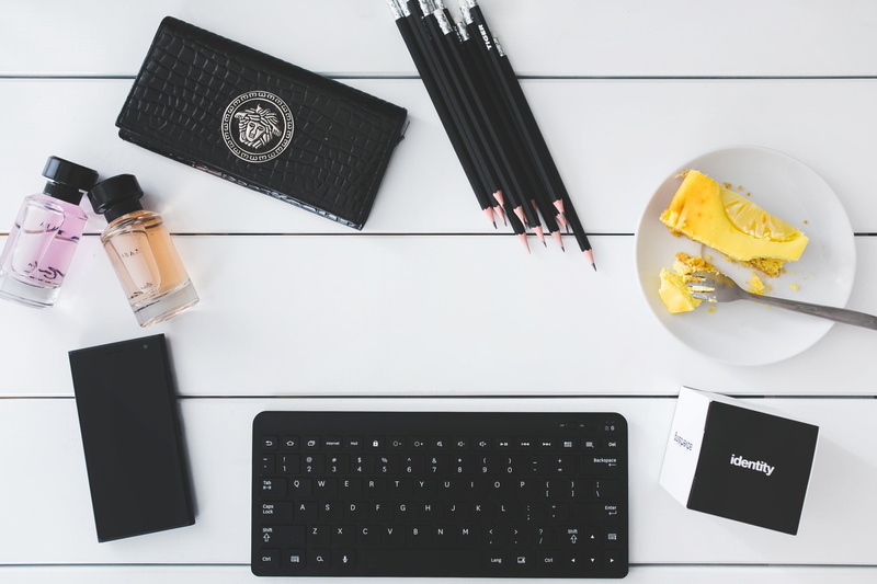 creativity, lady, officespace, keyboard, woman, wallet, phone, wireless, tech, bottles, glass, copyspace, communication, business, container, paper, personal Accessory