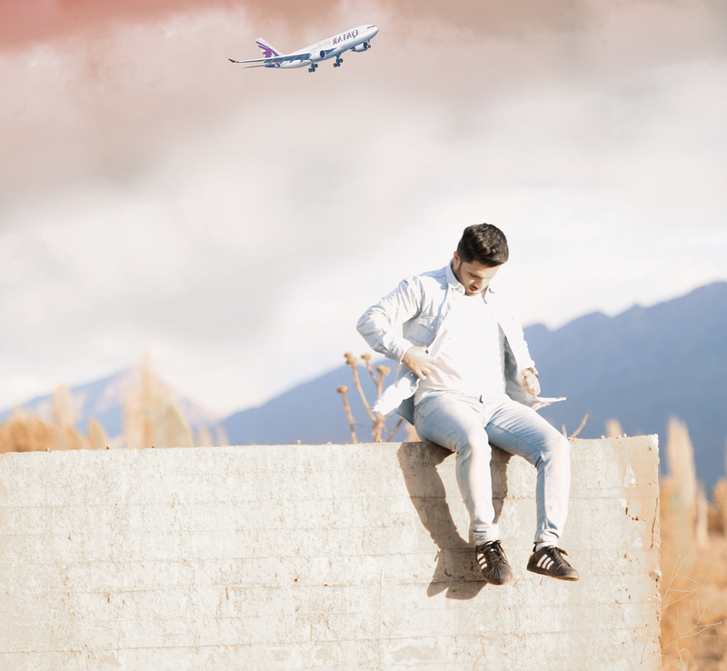 casual clothing, architecture, cloud - sky, leisure activity, young adult, men, nature, wall, one person, sky, ira, standing, built structure, young men