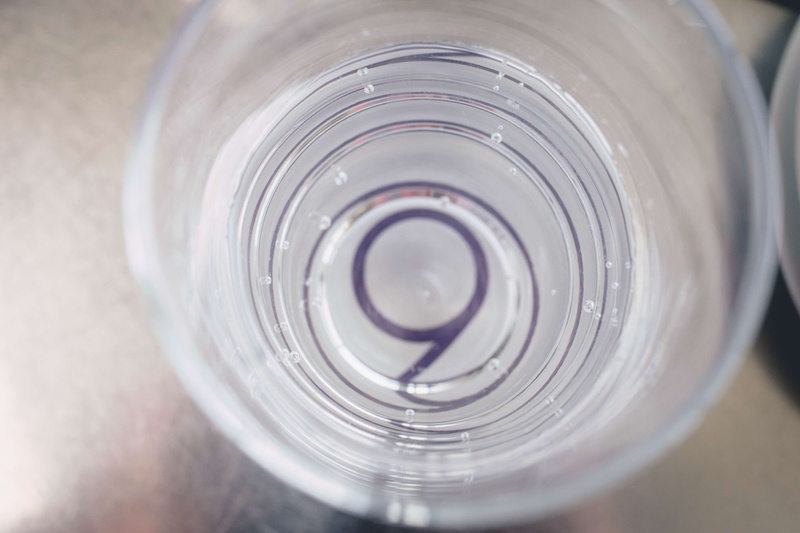 bar, close-up, food and drink, no people, drink, purity, selective focus, 9, high angle view, refreshment, bubbles, drinking water, shape, indoors, cloud 9