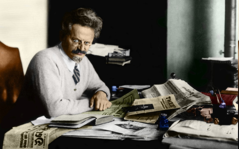 newspaper, holding, waist up, concentration, serious, facial hair, paper, one person, mature men, activity, adult, finance, 2K, indoors, reading, publication