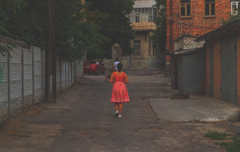 architecture, red dress, walking, footpath, real people, woman, lane, one person, 4K, casual clothing, the way forward, adult, ukraine, full length, city