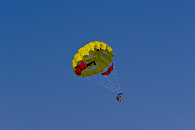 extreme sports, freedom, joy, leisure activity, transportation, Sky, clear sky, paragliding, blue, day, unrecognizable person, yellow, Parachute, sky, exhilaration