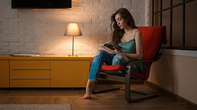 brunette, long hair, barefoot, women indoors, wavy hair, Sergey Fat, model, women, bare shoulders, reading, 1080P, torn jeans, sitting