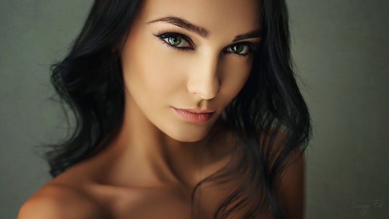 simple background, long hair, Sergey Fat, looking at viewer, Kseniya Alekseevskaya, dark hair, women, 720P, wavy hair, green eyes, makeup, eyeliner, portrait