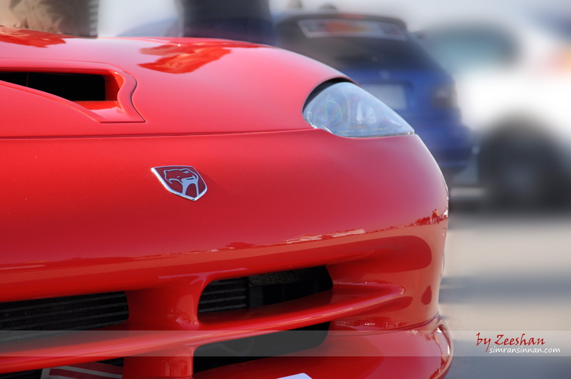 close-up, road, red, Dodge Viper SRT10, toy, Dodge Viper, car, focus on foreground, outdoors, land vehicle, tail light, street, Dodge, city, blue, day
