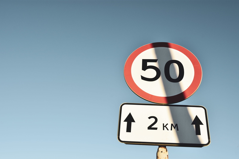 symbol, road signs, speed limit sign, signages, copy space, transportation, information, sky, sign, outdoors, direction, road sign, guidance, number, nature
