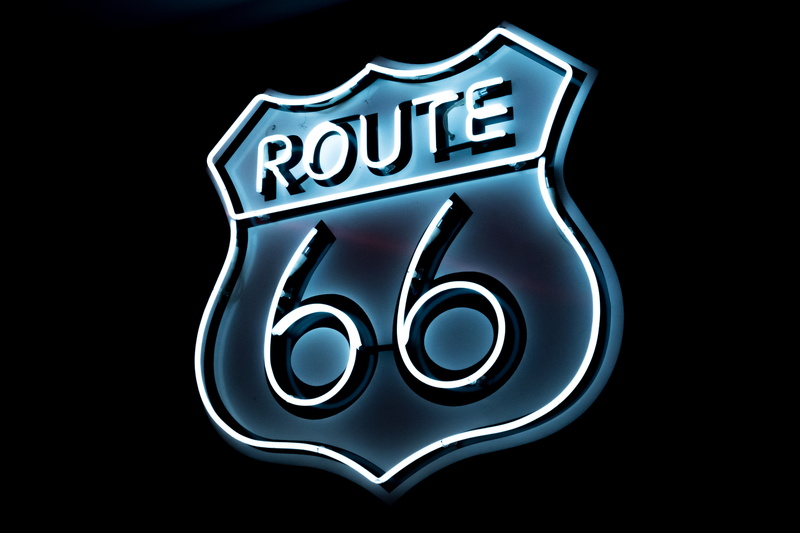 cut out, 5K, shape, text, communication, single word, sign, route 66, inscription, studio shot, no people, bright, reflection, black color, business, black background