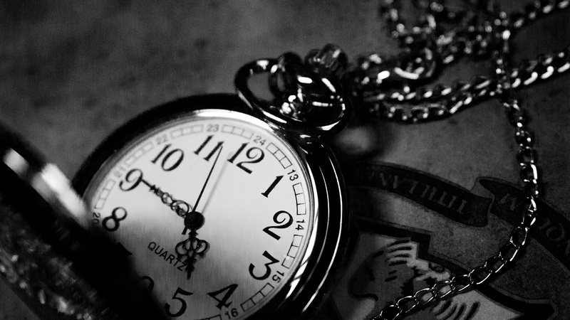 clock hand, pocketwatch, clock, accuracy, grayscale, indoors, photo, still life, clock face, vintage, number, necklace, connection, silver, focus on foreground