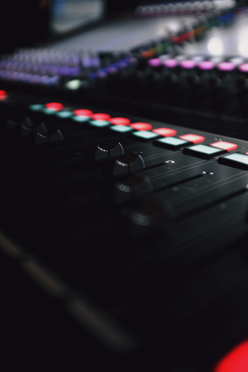 music, console, table, no people, arts culture and entertainment, lcd screen, selective focus, board, night, nightclub, close-up, audio, sound, fader, hardware