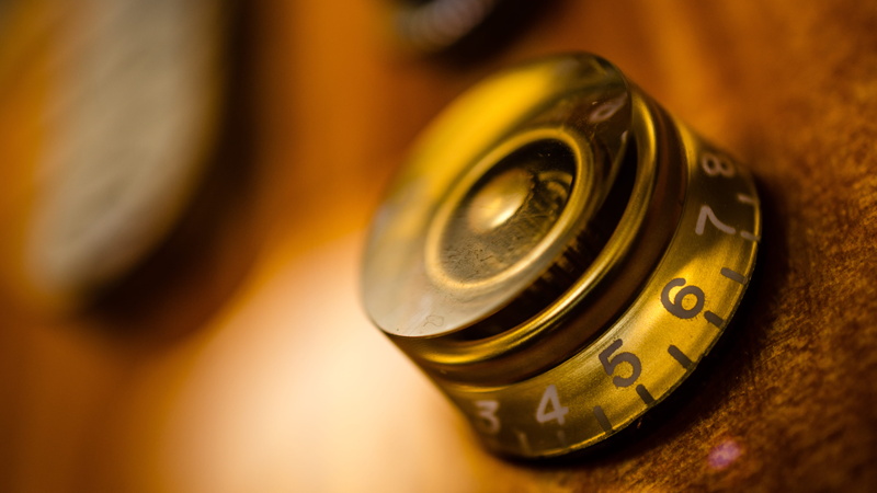 guitar, closeup, poti, still life, music, high angle view, knob, technology, gold, wood - material, macro, copy space, instrument, close-up, studio shot