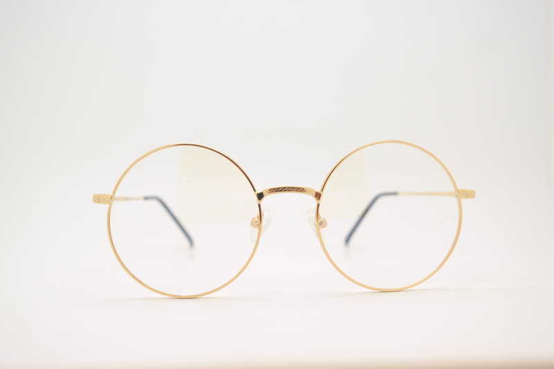 studio shot, glasses glass, cut out, luxury, broken, fashion, golden, summer, white background, optometrist, retro styled, 5K, fluke-angel therapy, close-up