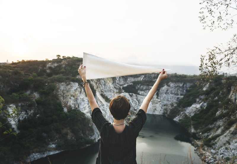leisure activity, waist up, sky, female, one person, hairstyle, traveling, freedom, front, rear view, body part, arms outstretched, nature, flaglet, grass