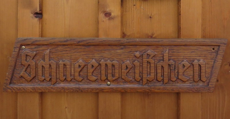 western script, old, carving - craft product, capital letter, day, 1080P, wall - building feature, entrance, text, wooden sign, snow white, fairy tales