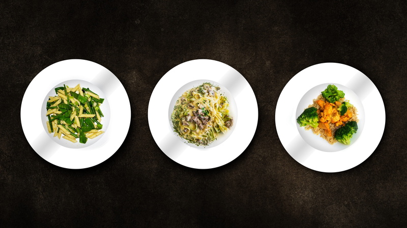 no people, pasta, plate, indoors, side by side, herb, wellbeing, plant, rice, vegetable, vegetables, healthy eating, dish, dinner, black background, directly above